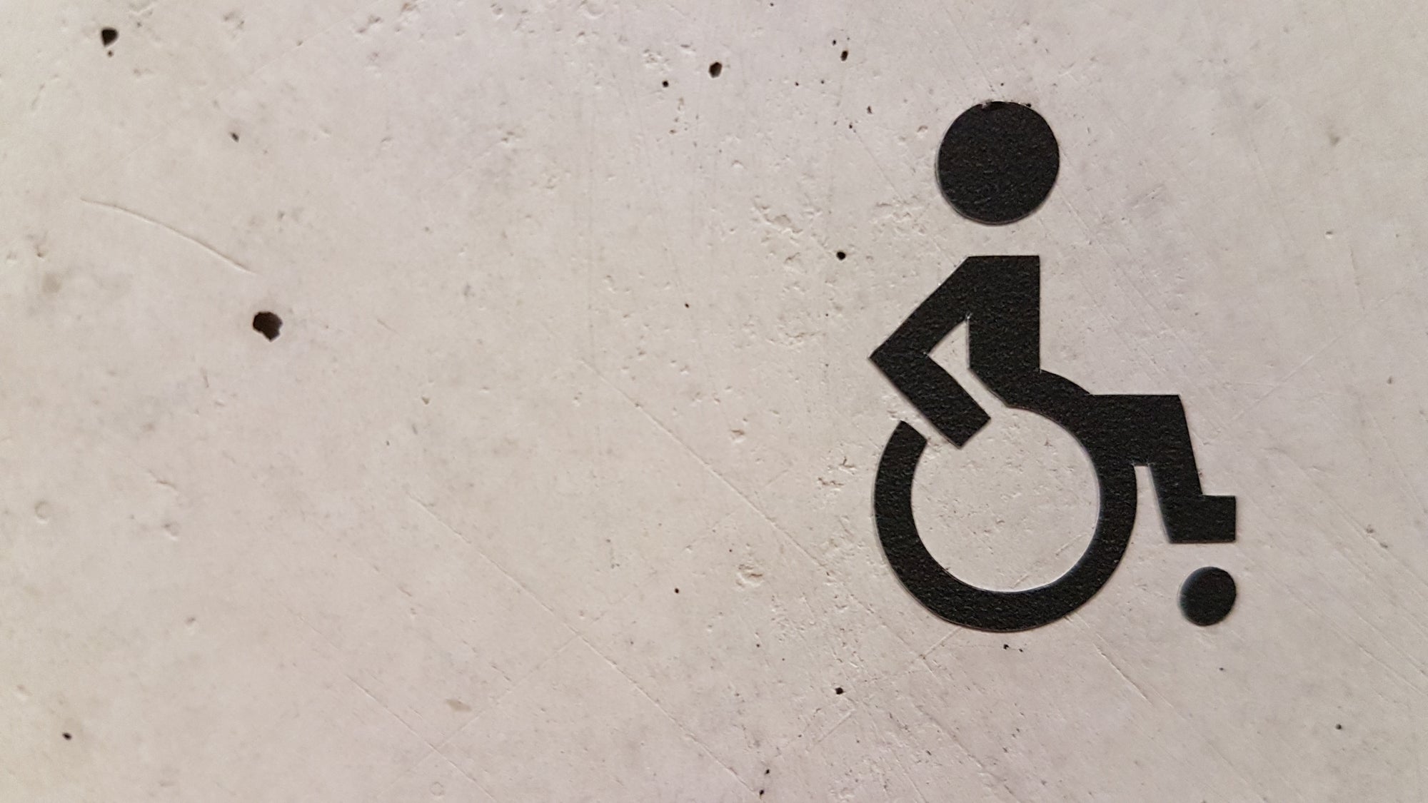 a wheelchair symbol representing injuries resulting from malpractice