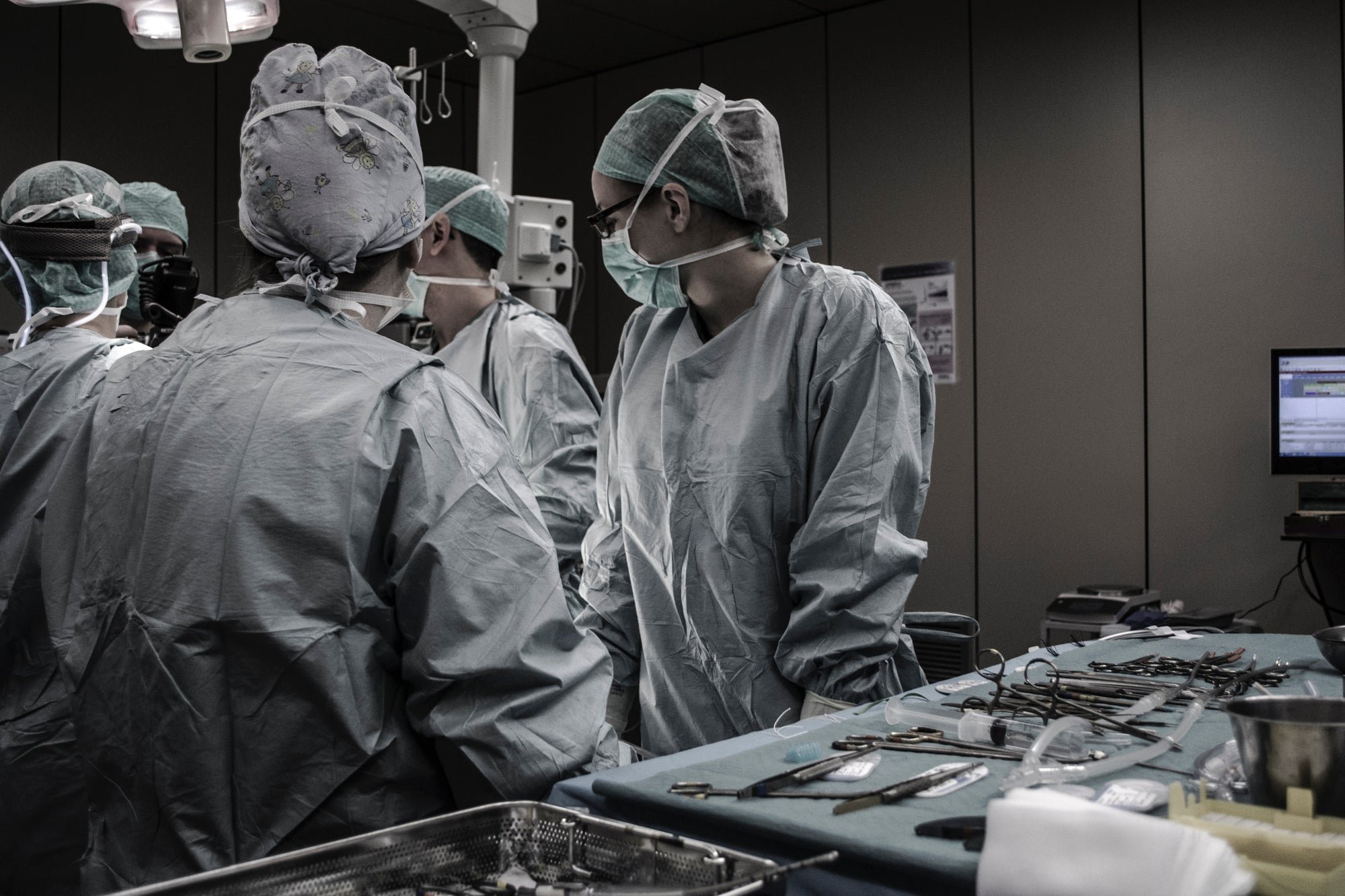 A team of medical professionals overseeing a surgery
